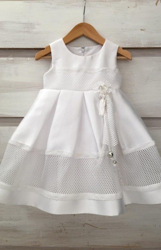 1909- White sleeveless dress with net design!